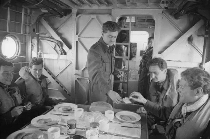 Crew members dining on a Sunderland flying boat,